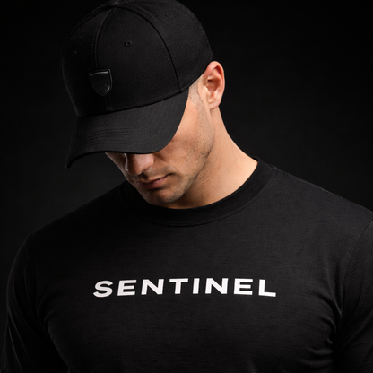 SENTINEL — The Standard Tee